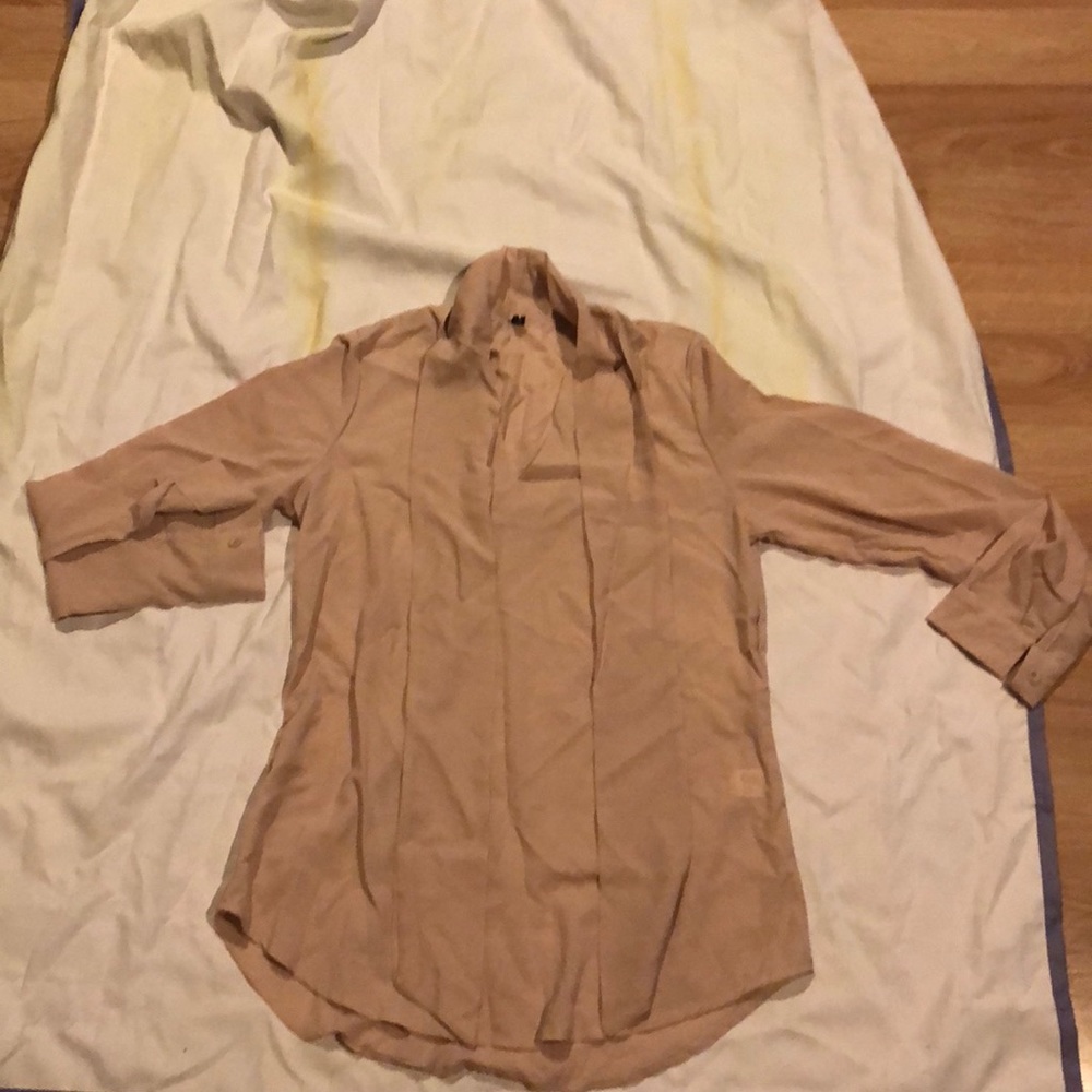 Beige button down woman shirt